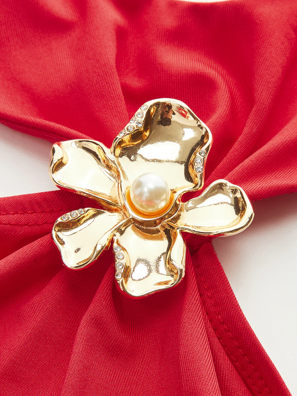 Semi-Sheer Halter Neck Ruched Top with Metal Floral Decor - Wholesalesil