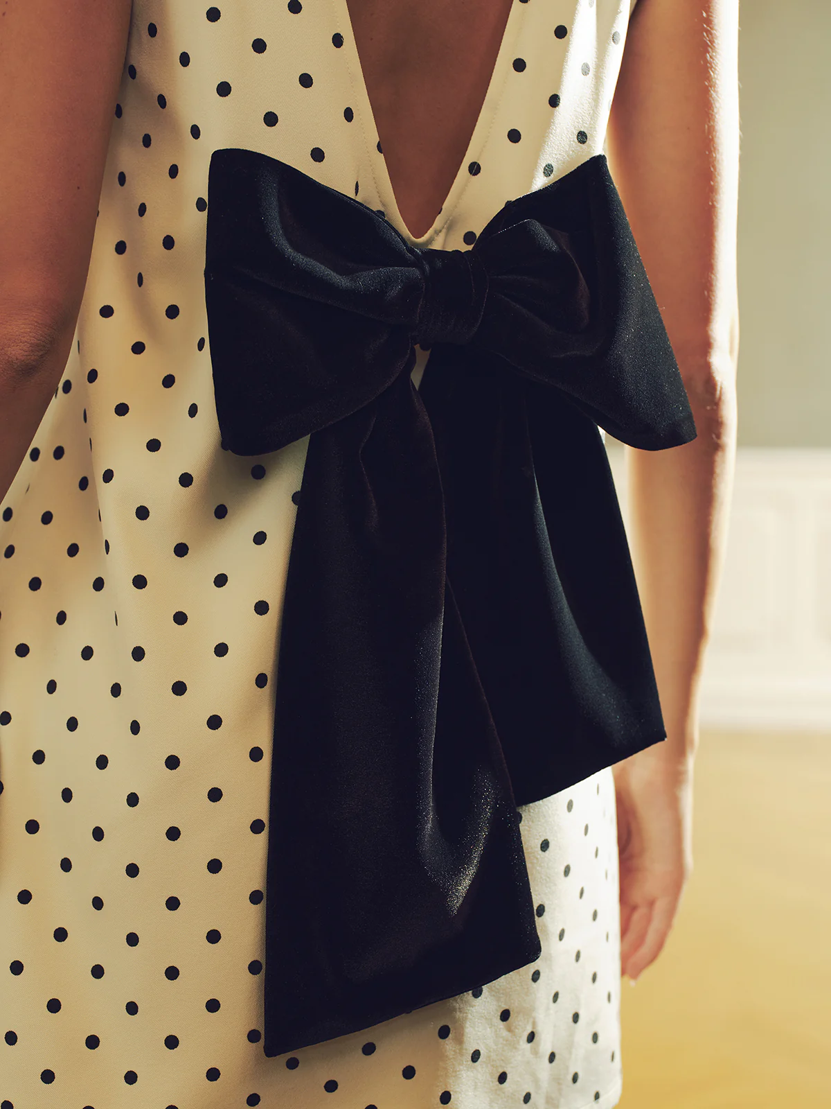 Polka Dot Mini Dress with Back Bow Detail - Wholesalesil