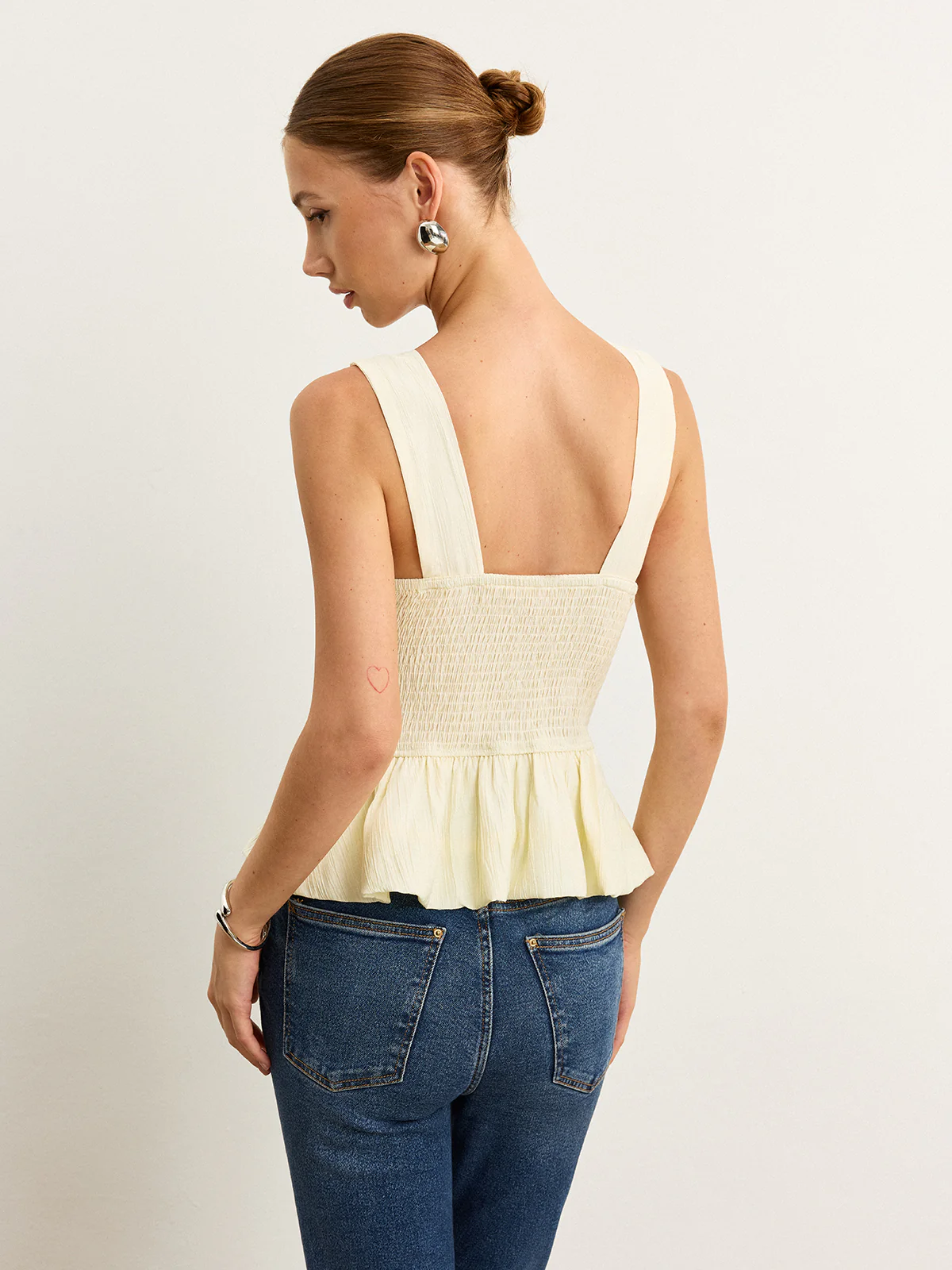 Bow-Detail Ruched Top with Peplum Hem - Wholesalesil