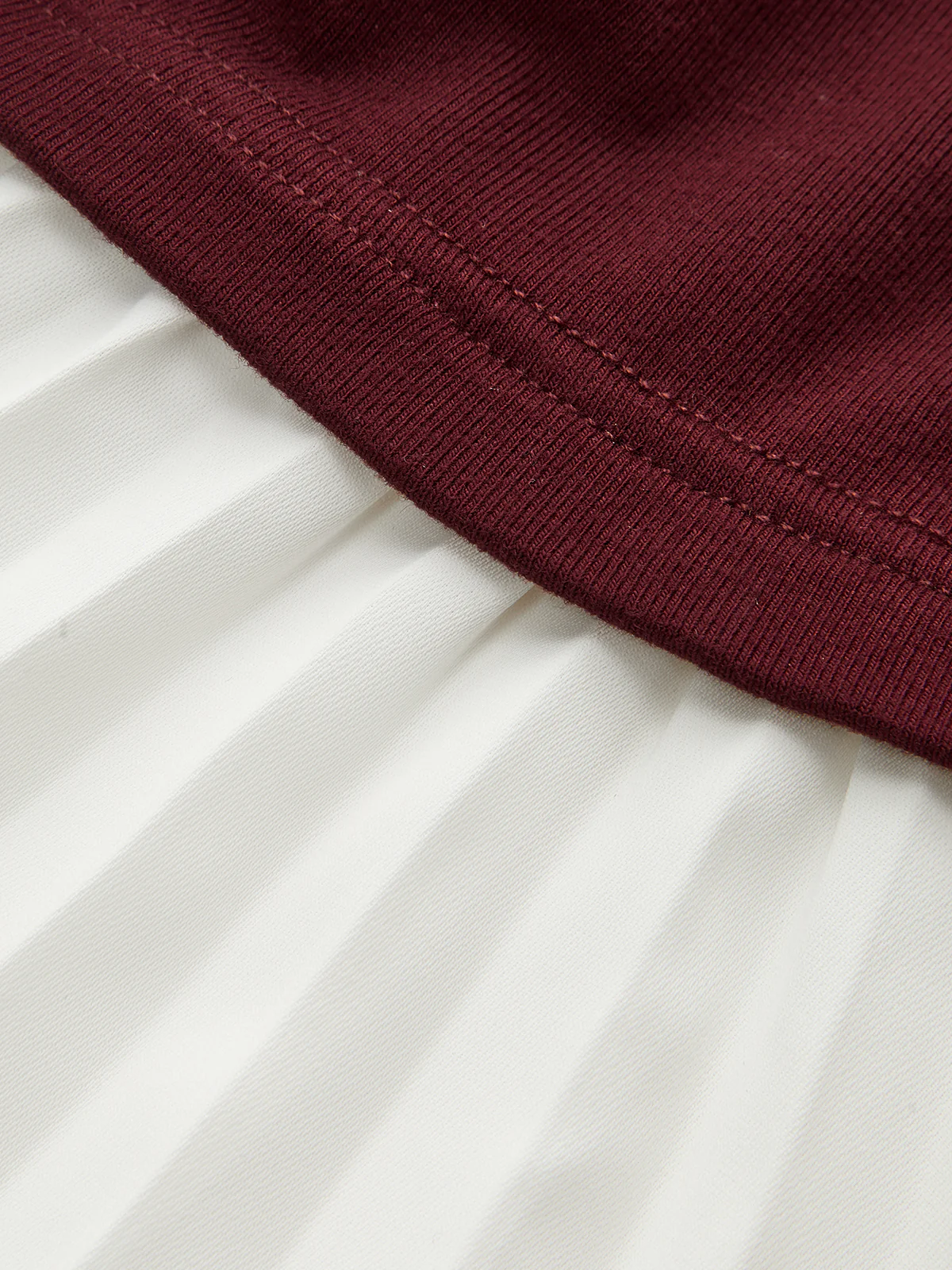 Contrast-Paneled Pleated Peplum T-Shirt - Wholesalesil